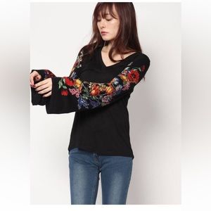 Desigual black top with floral sleeves